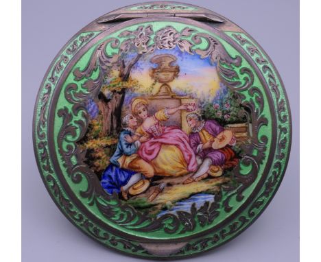 An Austrian silver and enamel compact. 7.5 cm diameter.