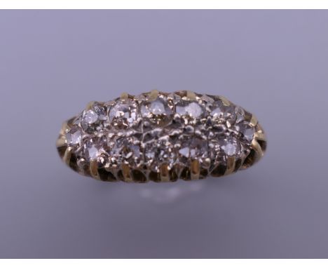 An 18 ct gold and diamond ring. Ring size O/P. 6 grammes total weight.