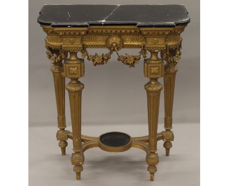 A marble topped gilt console table. 78.5 cm wide.