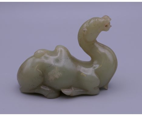 A Chinese jade carving of a camel. 8.5 cm long.