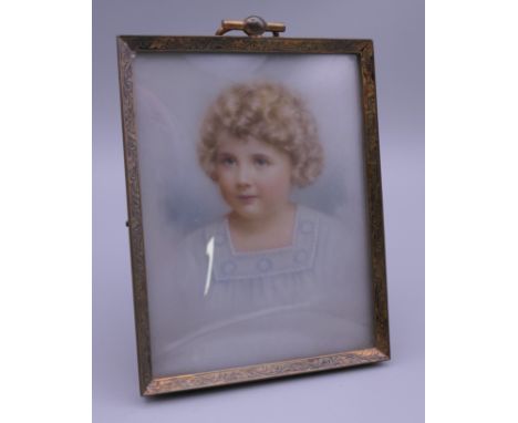 An early 20th century framed miniature portrait of a girl. 8.75 x 11 cm overall.