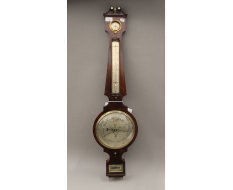 A 19th century mahogany banjo barometer. 100 cm high.