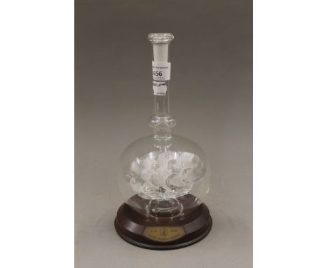 A glass ship in bottle, model of The Mary Rose. 25 cm high.