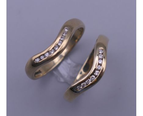 Two 9 ct gold nine stone diamond wishbone rings. Ring sizes K/L. 3.8 grammes total weight.