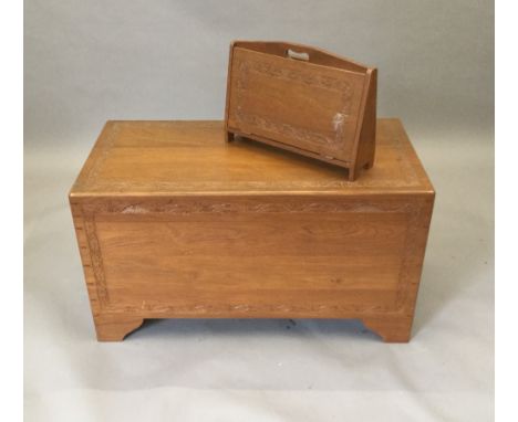 An Eastern carved camphor wood trunk and matching magazine rack