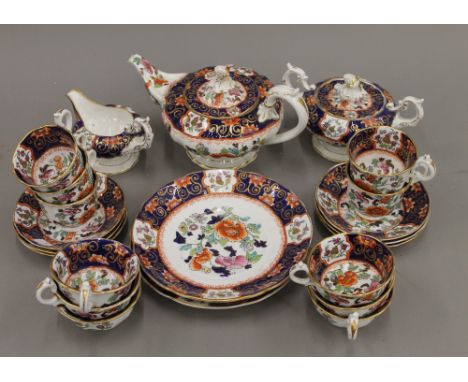 A 19th century Mason's Ironstone tea set, with pseudo Chinese marks, comprising teapot, twin handled sucrier and cover, cream