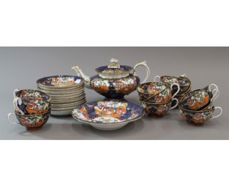 A 19th century Mason's Ironstone tea service, comprising tea pot, twelve cups and saucers, and a dished plate