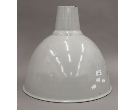 A vintage oversized enamelled industrial factory lamp shade