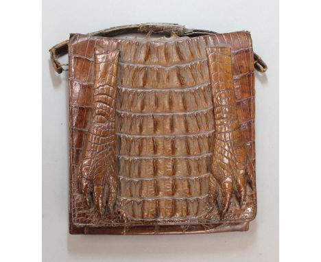A vintage crocodile skin handbag