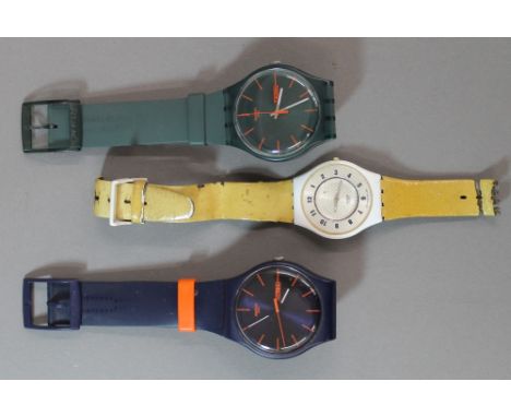 Three vintage Swatch watches