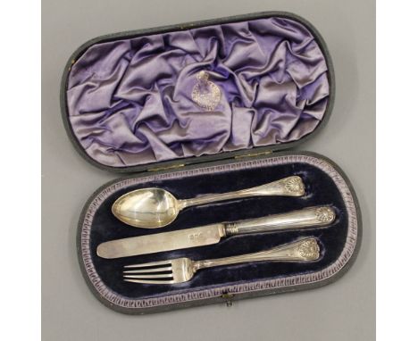 A cased silver knife, fork and spoon set (3.6 troy ounces total weight)