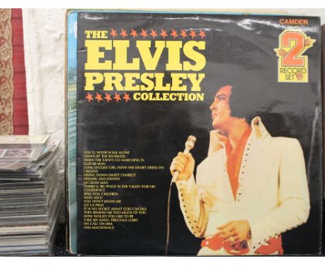 A quantity of vinyl LPs and 45s, including The Beatles, Elvis Presley, etc.