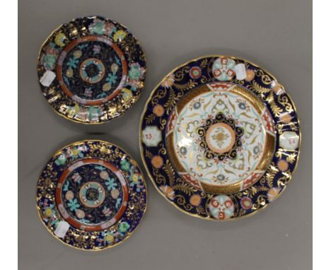 A gilt decorated Mason's Ironstone plate, together with two similar smaller plates