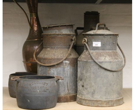 Three vintage metal churns, cauldrons and a ewer
