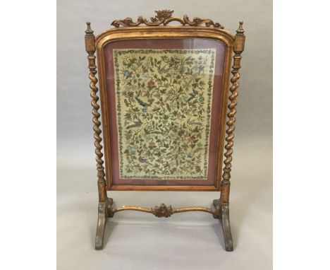 A Victorian tapestry inset fire screen