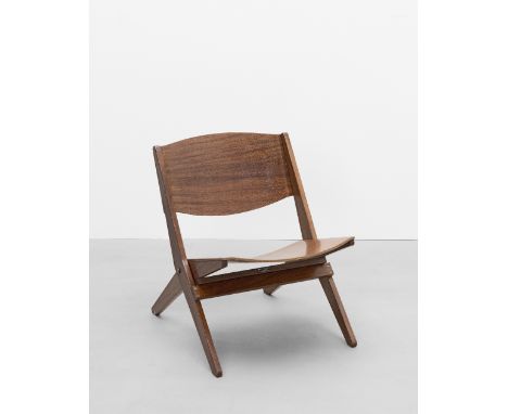 Ernest Race'Cormorant' folding chair, circa 1959Mahogany-veneered plywood, teak, brass.68.5 x 53.5 x 69 cmManufactured by Ern