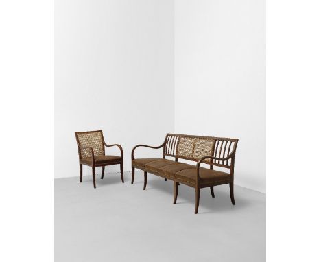 Frits HenningsenRare three-seater bench and 'Buede Arme' armchair, 1930s-early 1940s Mahogany, cane, leather upholstery, bras