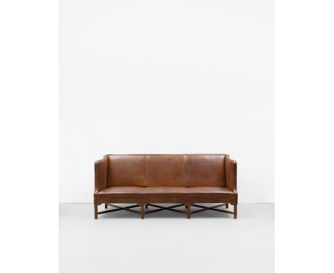 Kaare KlintThree-seater sofa, model no. 4118, designed 1930, executed 1950sAniline leather upholstery, mahogany. 87 x 200 x 8