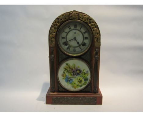 A late 19th Century American style mantel clock by the Maochi Clock Co of the Far East,with black Roman numerals to the cream