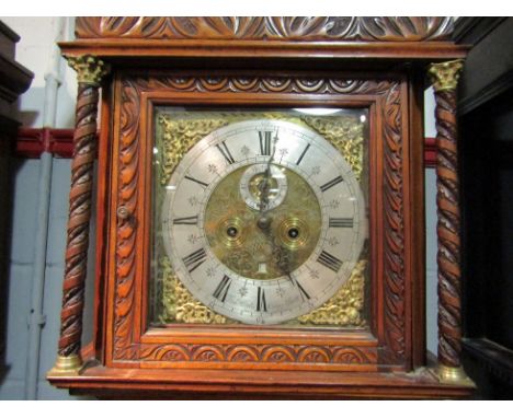 An 18th Century longcase clock dial and movement, with black Roman numerals and subsidiary Arabic minutes to the 28cm diamete