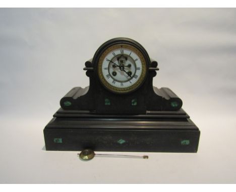 A late Victorian black slate mantel clock, with black Roman numerals to the white enamelled face centred by a visible Brocot 