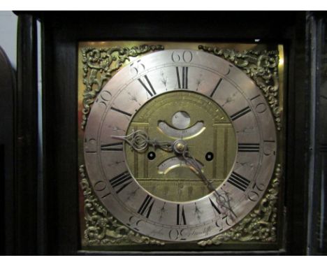 An 18th Century longcase clock, with black Roman numerals and subsidiary Arabic minutes to the 27cm diameter silvered chapter