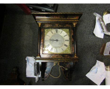 An 18th Century wall clock, with black Roman numerals to the 23cm diameter silvered chapter ring around an engraved seascape,