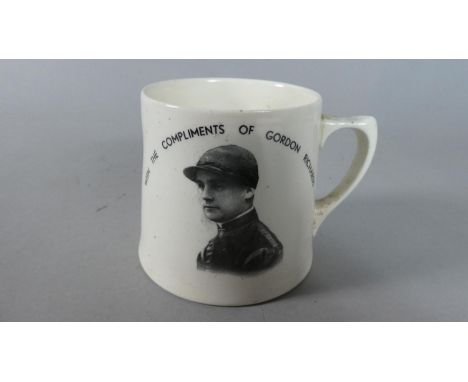 A Ceramic Commemorative Mug Inscribed to One side 'With Compliments of Gordon Richards' with Transfer Printed Image of Jockey