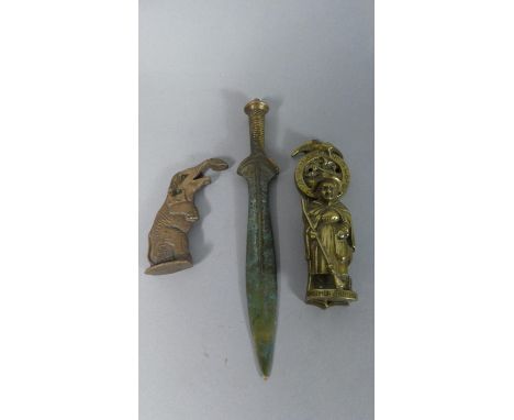 A Vintage Brass "Mother Shipton" Door Knocker, A Novelty Brass Bottle Opener in the form of an Elephant and a Brass Letter Op