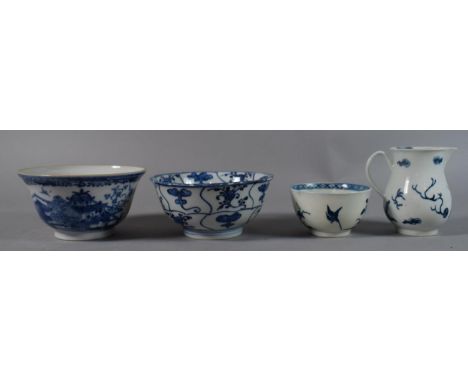 A Worcester Blue and White Tea Bowl, a Blue and White Cream Jug with Dragon Decoration and Two Blue and White Oriental Bowls