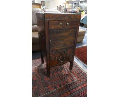A Georgian Mahogany Gentleman's Washstand with Hinged Top Over Drawer, Central Cupboard and Pull Out Commode with Two Dummy D