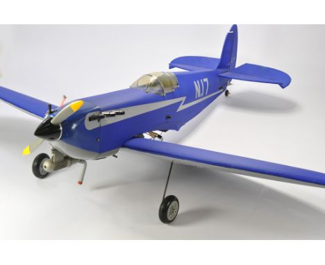 An impressive Spitfire Model Aircraft complete with all parts, engine and internals (presumed ready to fly with appropriate c