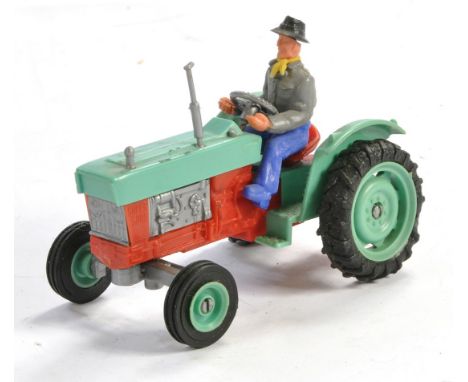 Timpo Vintage Plastic Ford 5000 Tractor with Driver. Version is red and blue with silver engine. Generally very good, would b