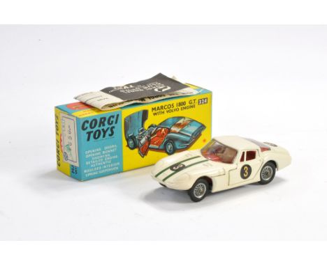 Corgi No. 324 Marcos 1800 GT with Volvo Engine. Matt white with red interior plus wire wheels. Generally excellent with very 