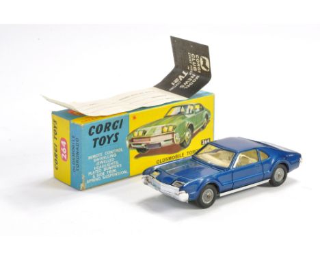 Corgi No. 264 Oldsmobile Toronado. Dark metallic Blue with white interior. Generally excellent with very little sign of wear 