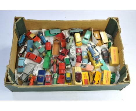 A large tray of Vintage Dinky Diecast Vehicles including some with (repro) boxes. Some issues with repainting. Otherwise an i