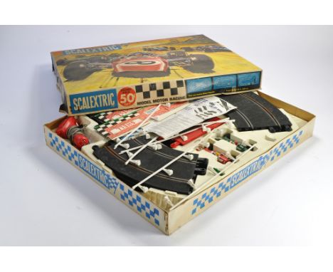 Vintage Scalextric Set no. 50. Looks to be mostly complete but not checked for exact completeness. Untested. 