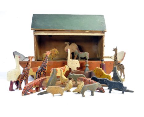 A scarce Antique Wooden Noah's Ark Toy with carved hand painted animal figures as shown. In addition two figures to resemble 