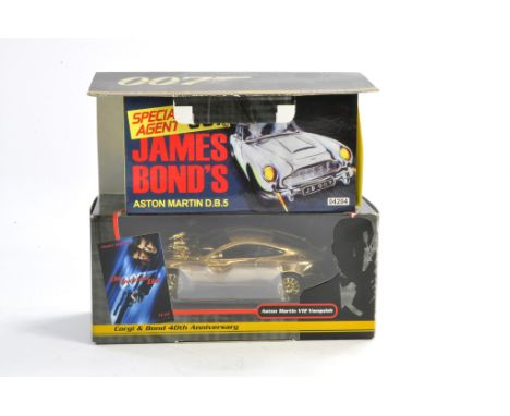 Corg James Bond 007 Aston Martin duo comprising No. 04204 (silver) plus 40th Anniversary Gold Plated V12 Vanquish. Both excel