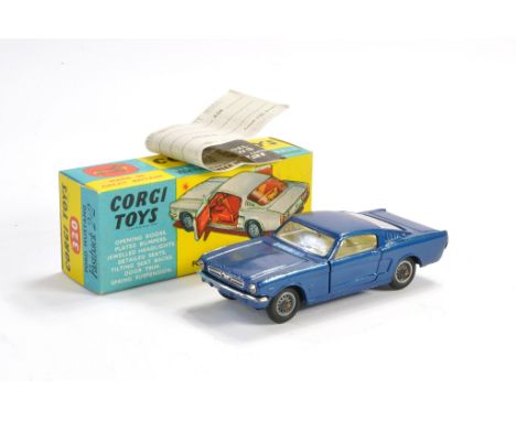 Corgi No. 320 Ford Mustang Fastback 2+2. Dark Blue with white interior. Generally excellent with very little sign of wear, th
