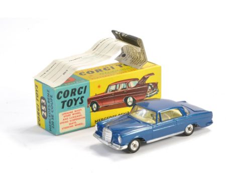 Corgi No. 253 Mercedes Benz 220 SE Coupe. Dark Blue with off-white interior (spare wheel plus brown luggage x 2 in boot). Gen