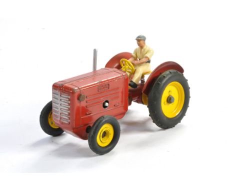 Solido Vintage Mechanical Tractor in red, with driver. In good working order. Generally good with some fading to paint and th