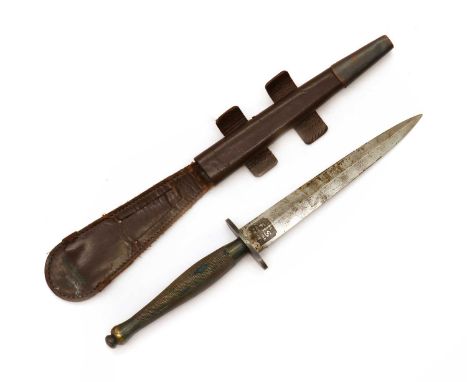 A WWII Fairbairn Sykes Fighting knife,probably Second Pattern, by Wilkinson Sword Co Ltd, the blade etched 'The F-S Fighting 