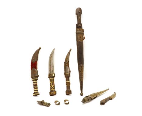 A Caucasian Kindjal dagger,late 19th to early 20th century, with a leather and metal-mounted scabbard,blade 38cm, total 50.5c