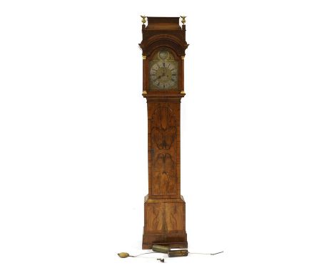 A walnut eight-day longcase clock,the brass arched dial signed Joseph Smith, Bristol, with a silvered chapter ring, date aper