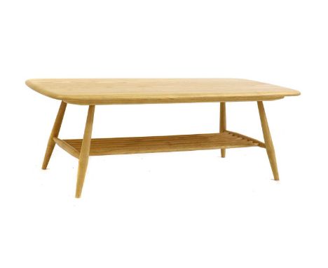 A Ercol originals coffee table,of recent manufacture, in straw colourway, with shaped rectangular top and slattered undertier