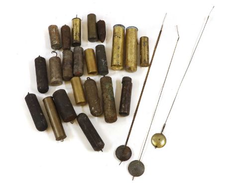 A collection of longcase clock weights and pendulums,to include a brass clad month going pair of weights,(qty.)Provenance: Th