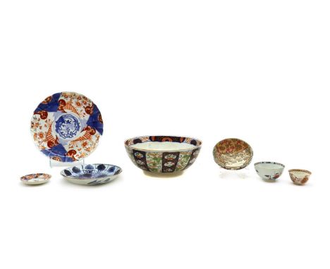 A group of Japanese ceramics,19th-20th century, comprising:a punch bowl, one charger, one plate, one saucer and two bowls,10.