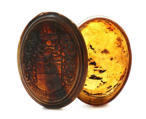 A pressed horn snuff box,early 18th century, attributed to John O'Brisset, inscribed 'Sir Francis Drake' above the arms of th