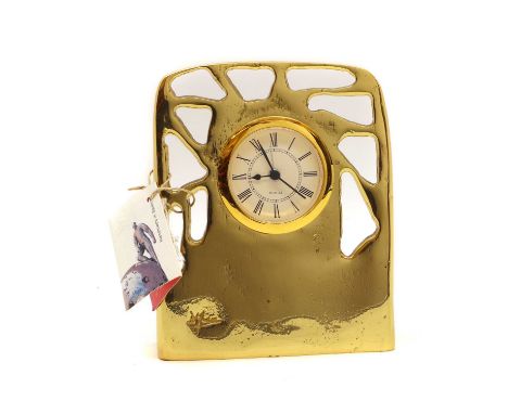 A David Marshall brass mantel timepiece,with a pierced frame and quartz movement,15cm highCondition ReportMinor surface wear 